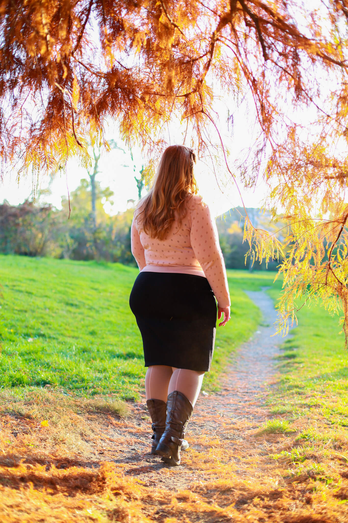 woman walking away with lipedema